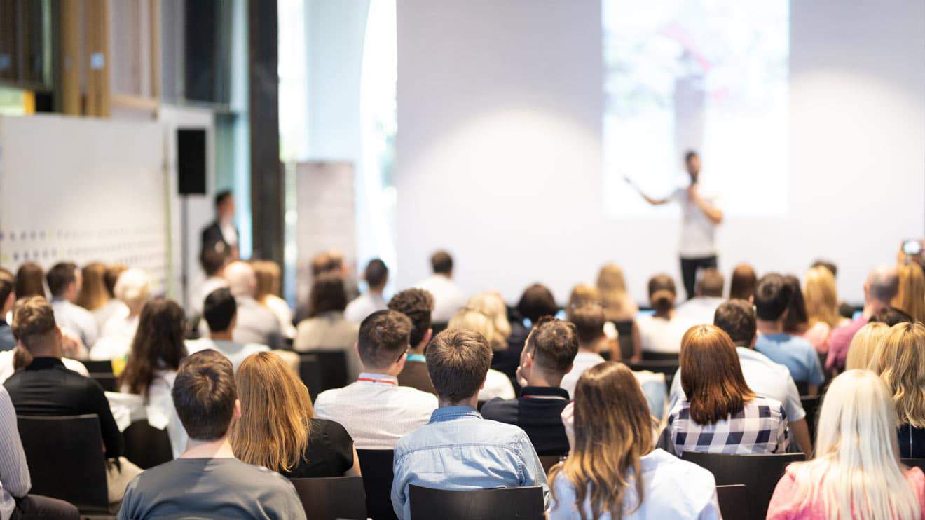 Zuschauer bei einer Tagungsveranstaltung